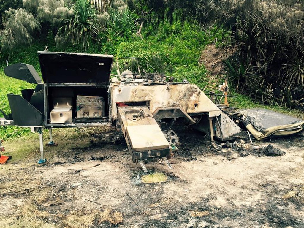 The damaged remains of the family's camper, destroyed by fire. The damaged remains of the family's camper, destroyed by fire.